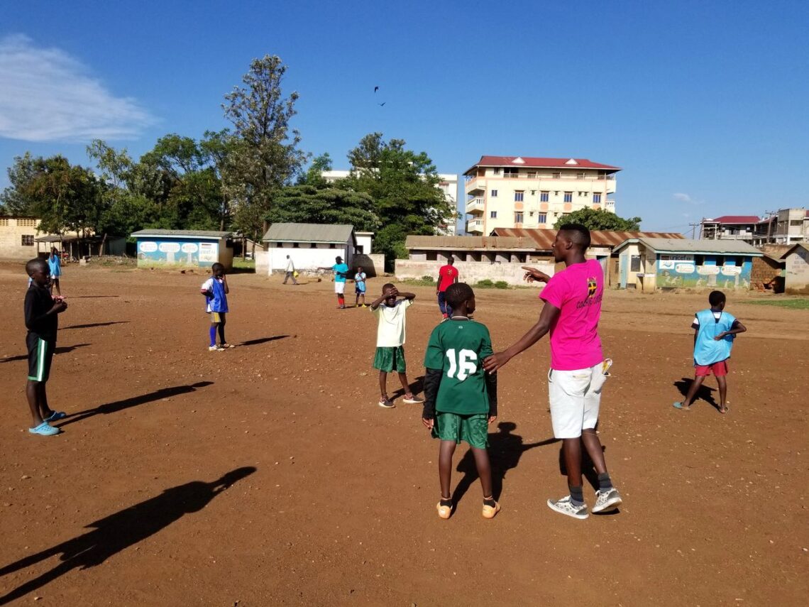 Aivan teaching positional adjustments to the players.